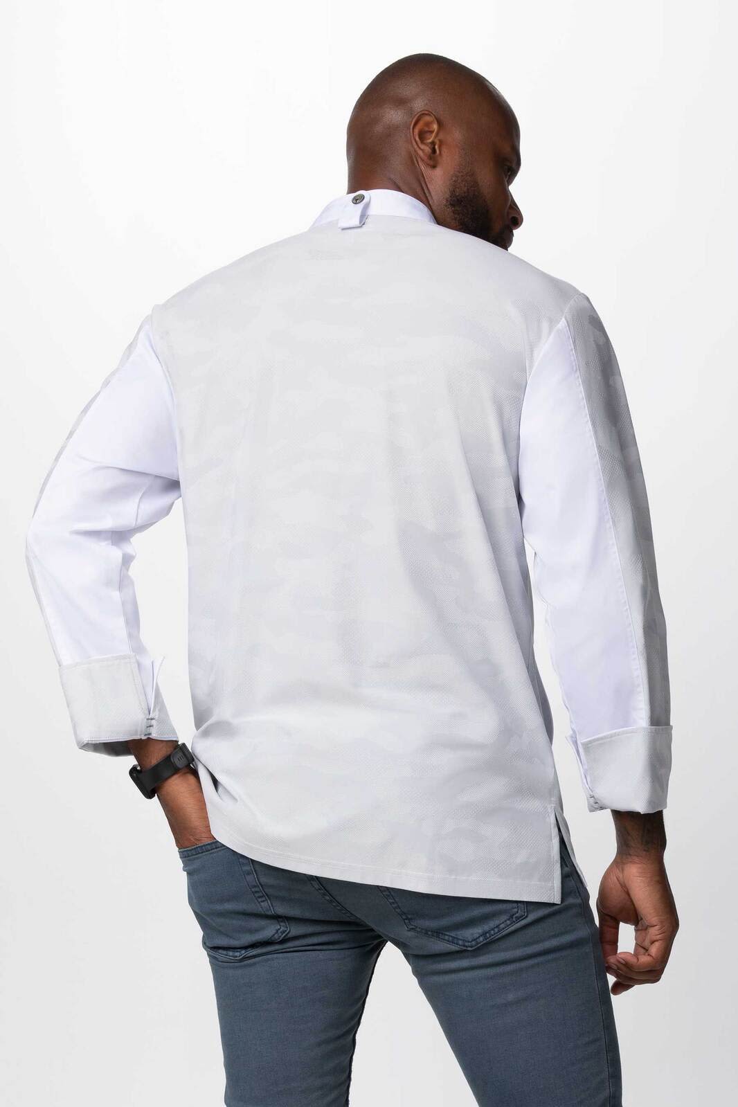 A men's chef jacket in green with long sleeves, featuring contrasting white cuffs and a logo on the back.