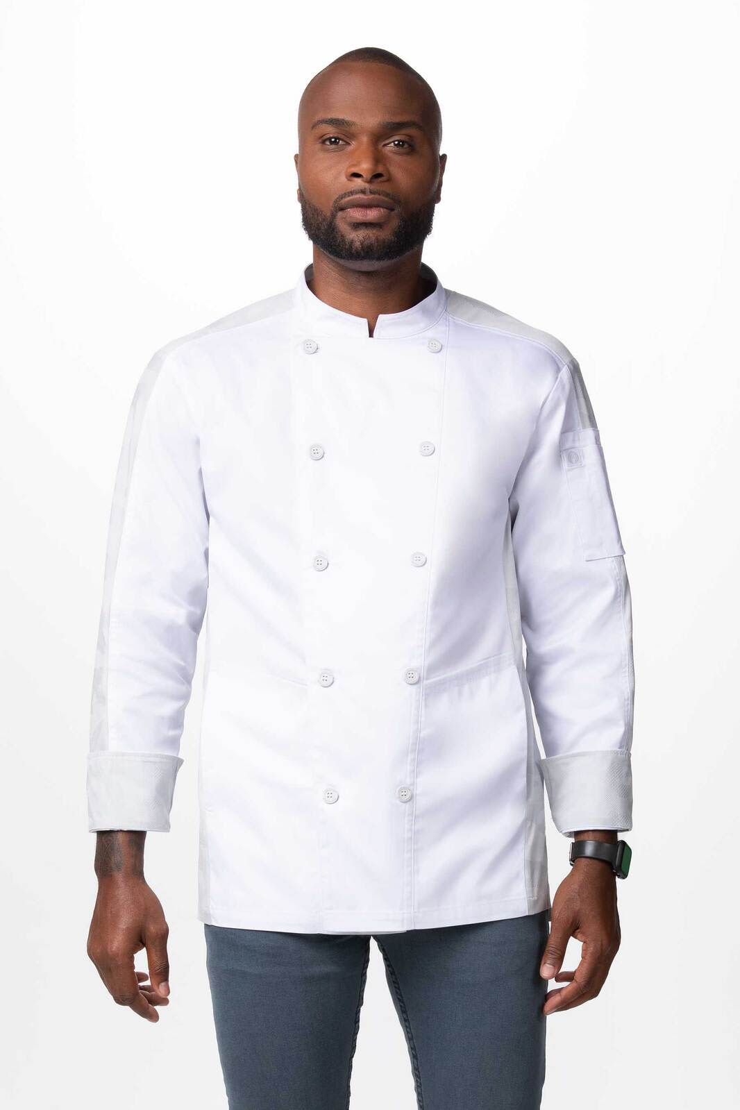 A chef jacket in white, featuring a double-breasted design and long sleeves, worn by a man.