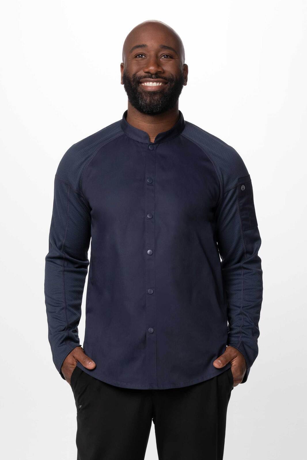 A men's chef jacket in navy blue with long sleeves and a button-up front, featuring a logo on the sleeve.
