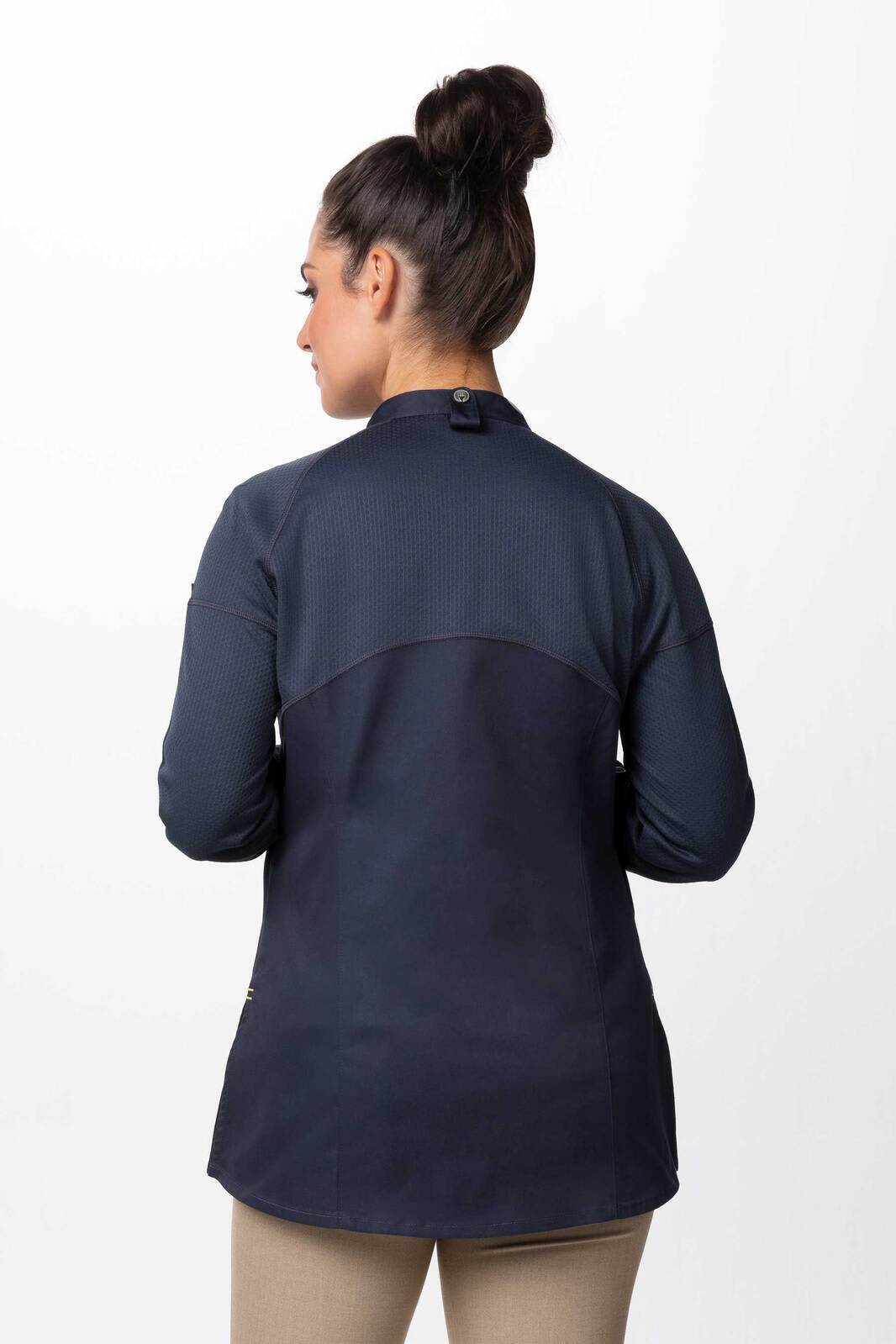 A navy blue women's chef jacket featuring a sleek design and a logo on the back.