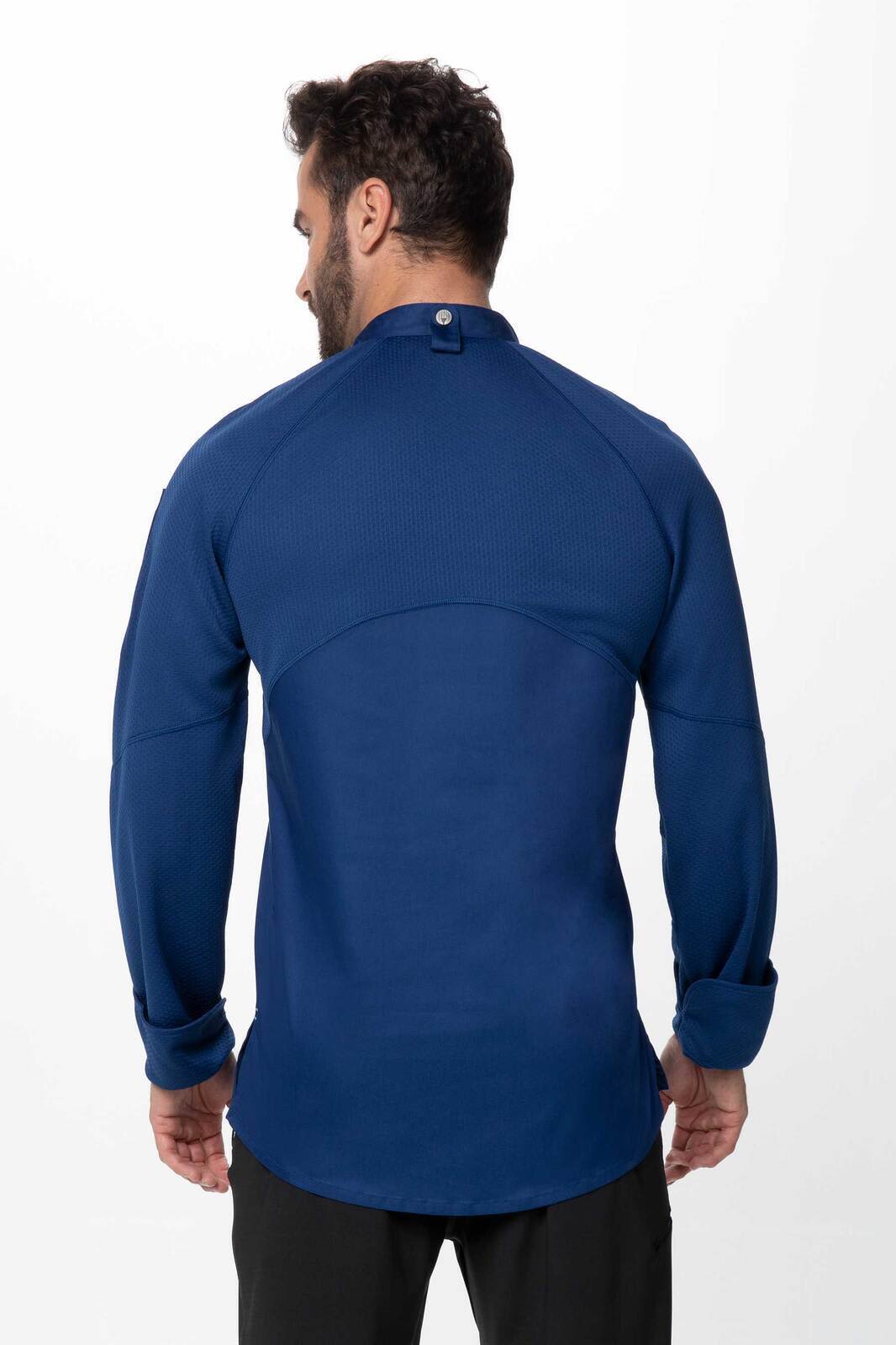A men's chef jacket in navy blue featuring long sleeves and a back button detail. It includes a logo.