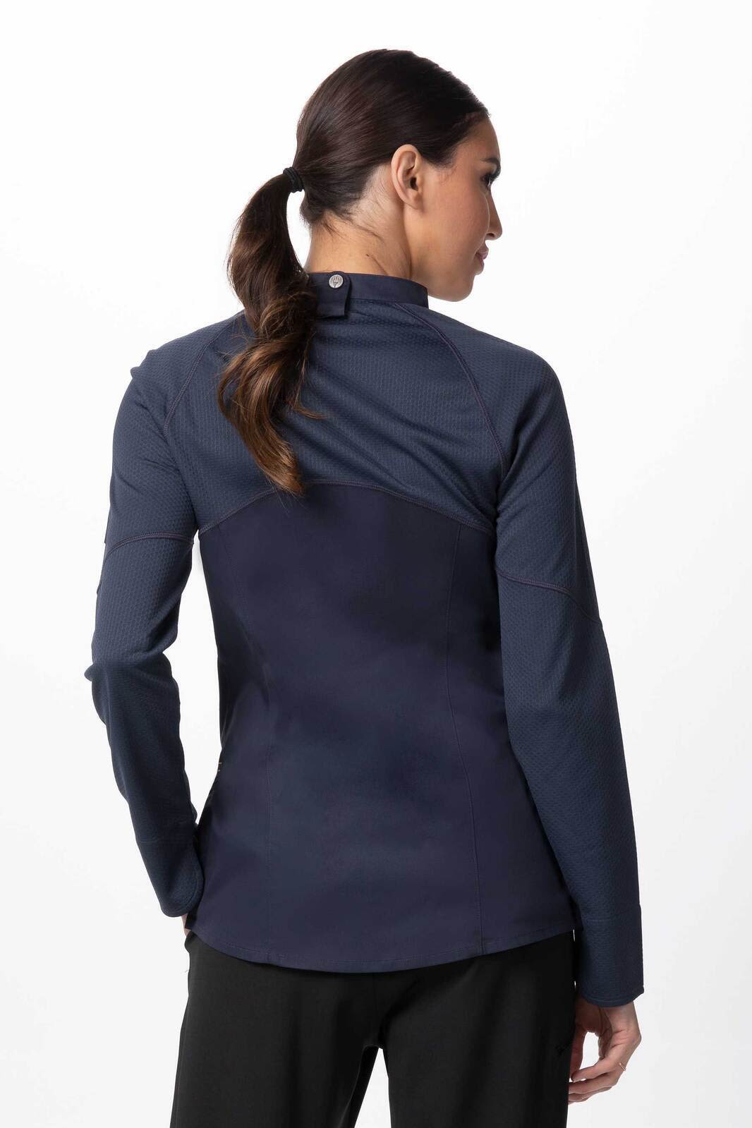 A women's chef jacket in navy blue with a fitted design and a buttoned collar, featuring a logo on the back.
