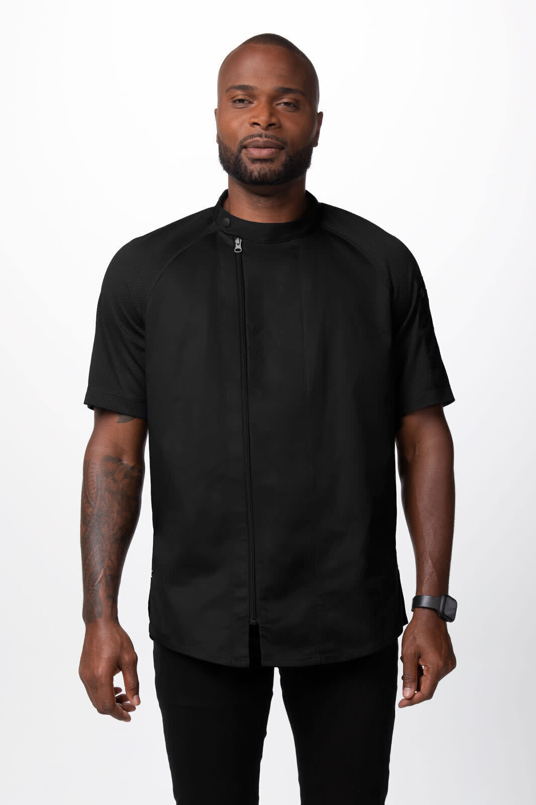 A black men's chef jacket with a zip closure and short sleeves, featuring a subtle logo.