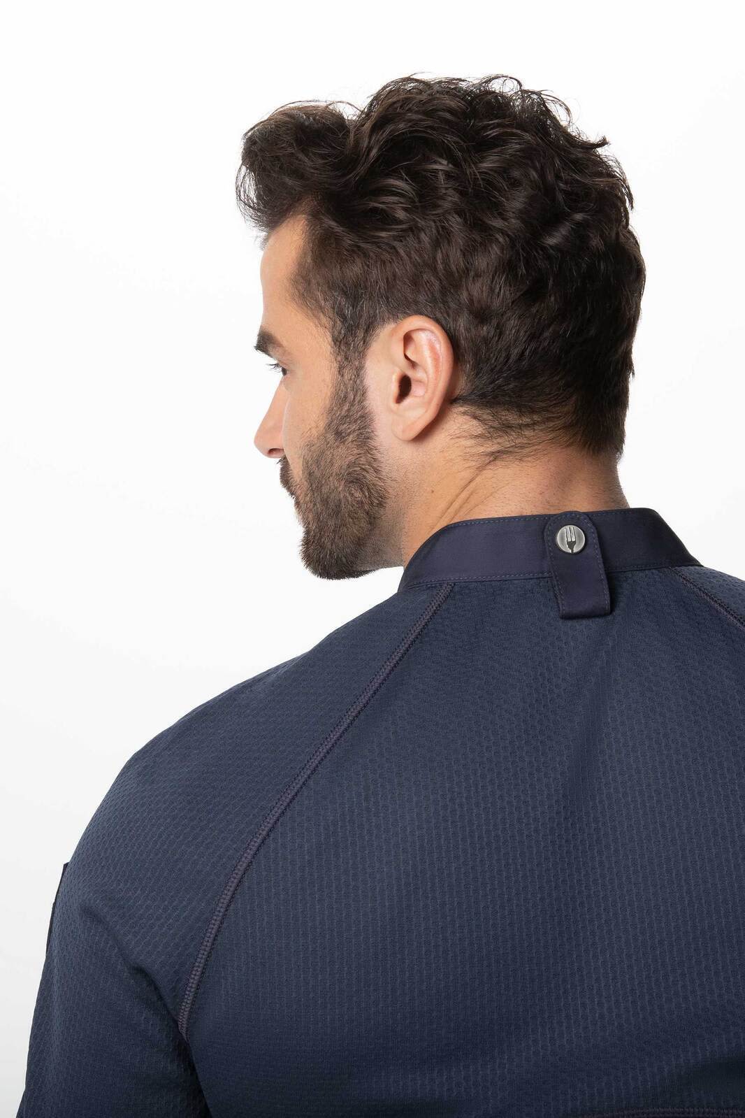 A navy blue men's chef jacket featuring a modern collar and logo on the back.