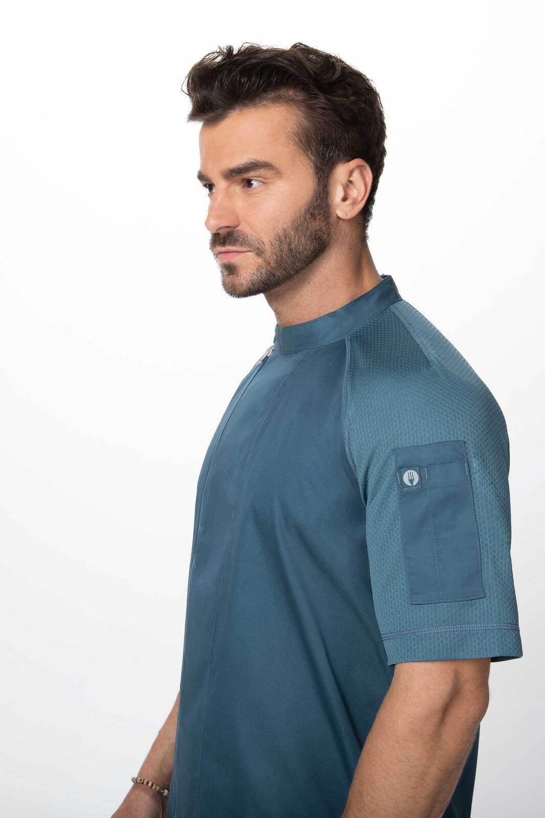 A teal chef jacket featuring a short sleeve design and a side pocket, designed for men's wear.