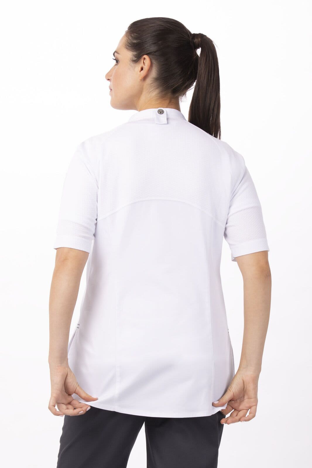 A women’s chef jacket in white, featuring short sleeves and a button closure at the back, with a visible logo.