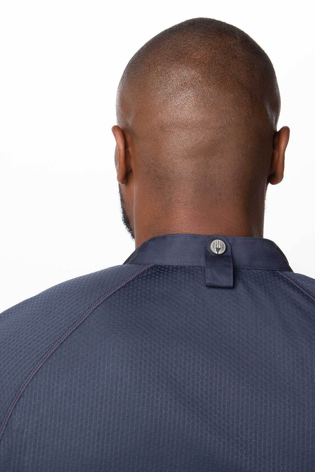 A men's chef jacket in navy with a button and a sleek collar design, featuring a logo on the back.