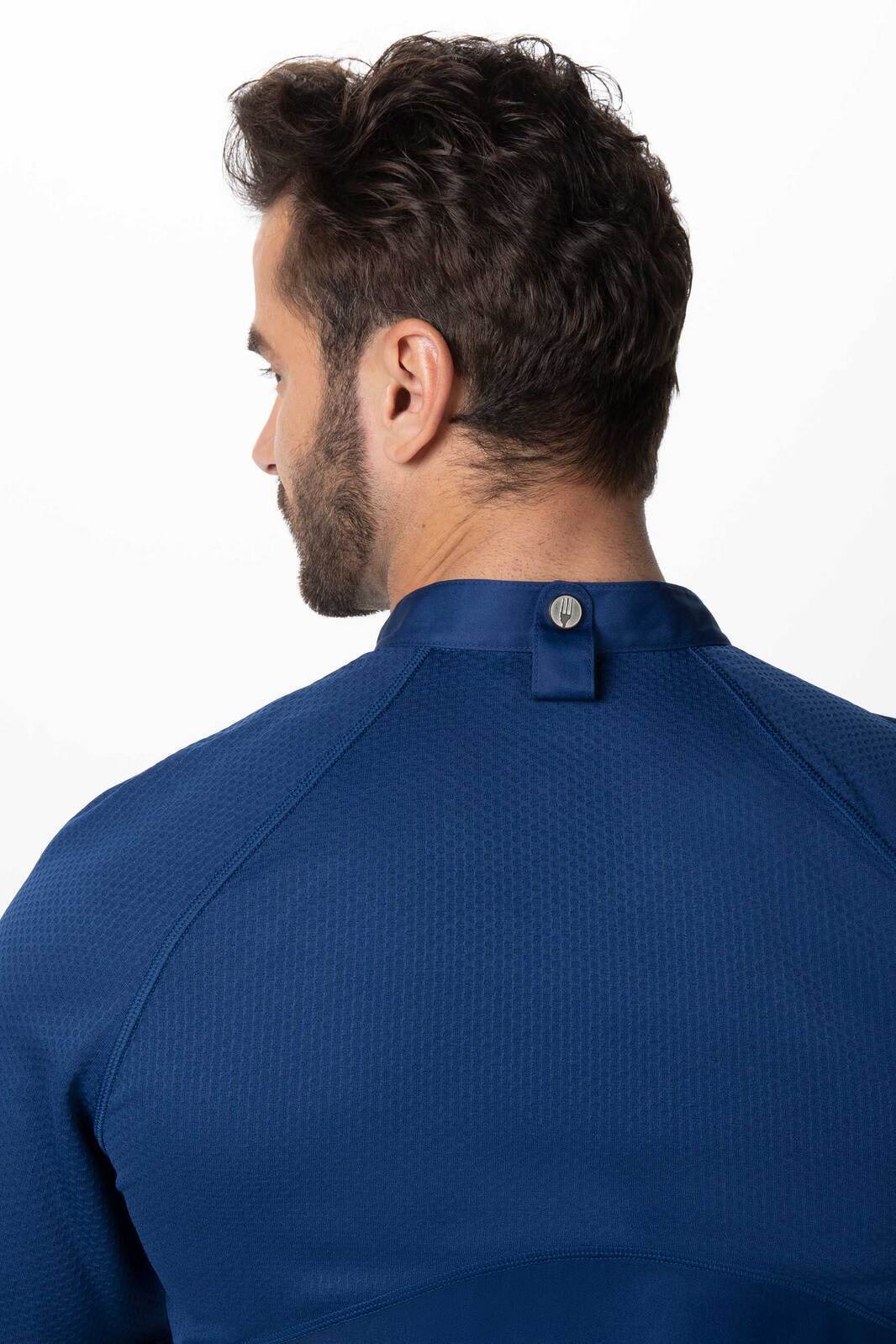 A men's chef jacket in navy blue, featuring a closed collar and a logo on the back.