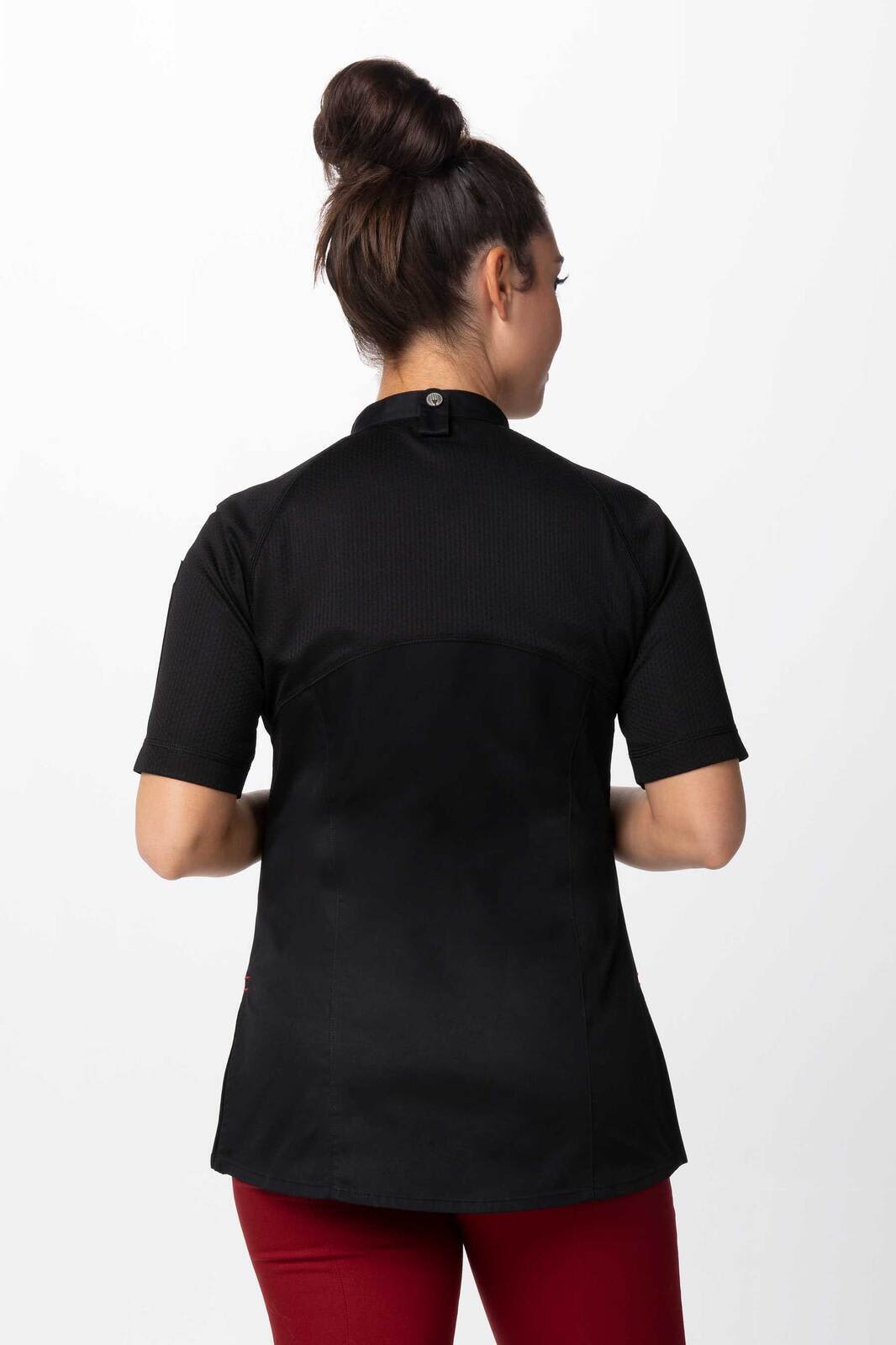 A black women's chef jacket with short sleeves, featuring a collar and logo at the back.