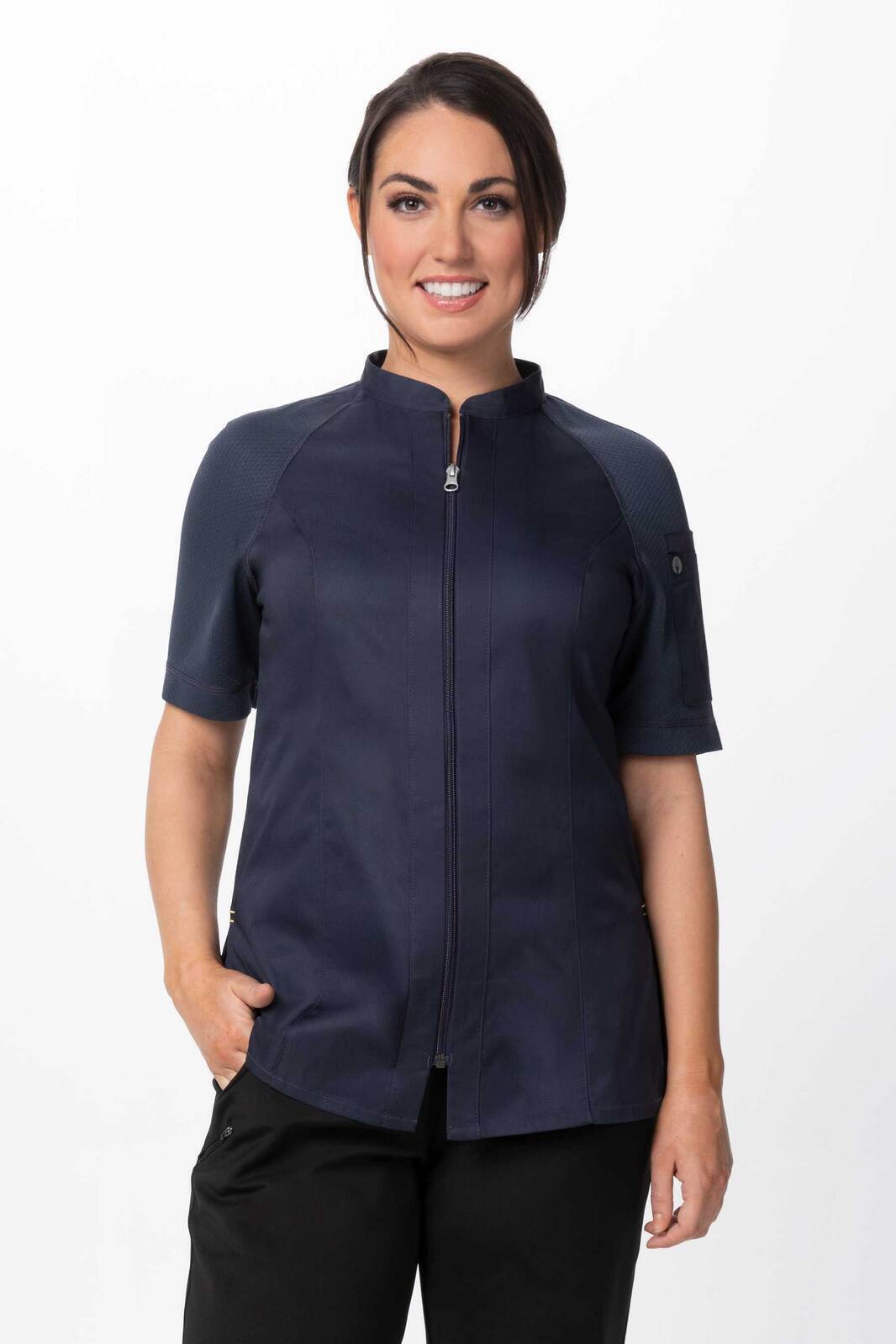 A women's chef jacket in navy blue with short sleeves and a zip-up front, featuring a logo on the sleeve.