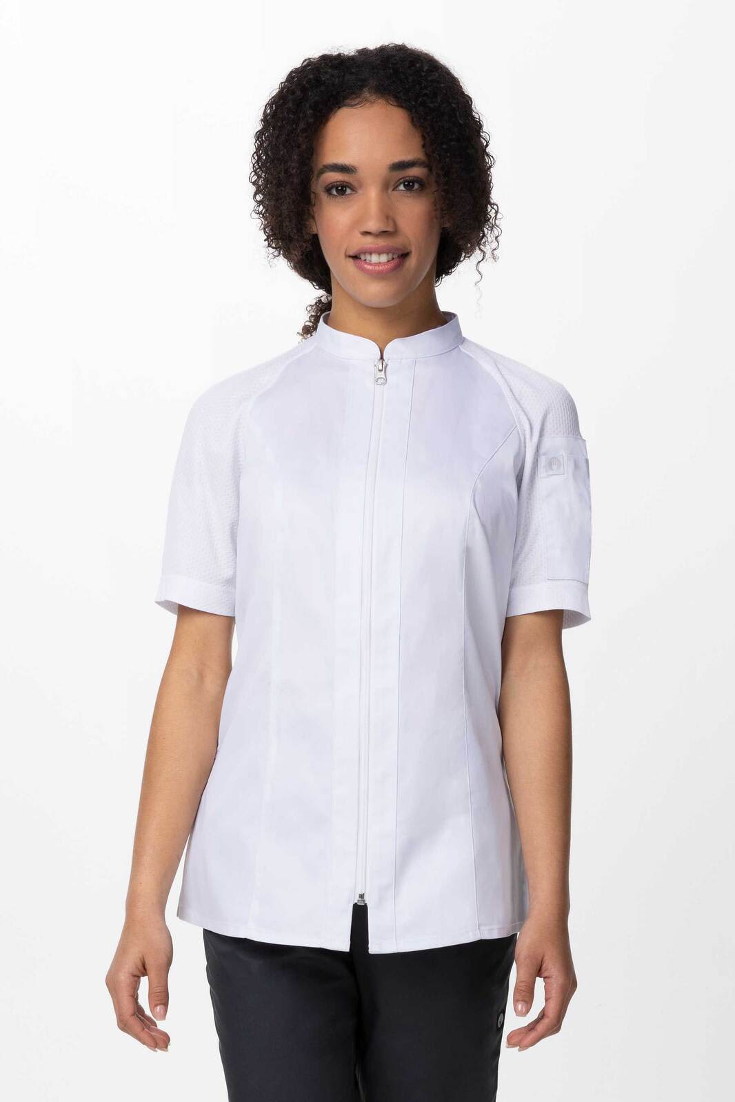 A white women's chef jacket with short sleeves and a zip front, featuring a logo on the sleeve.