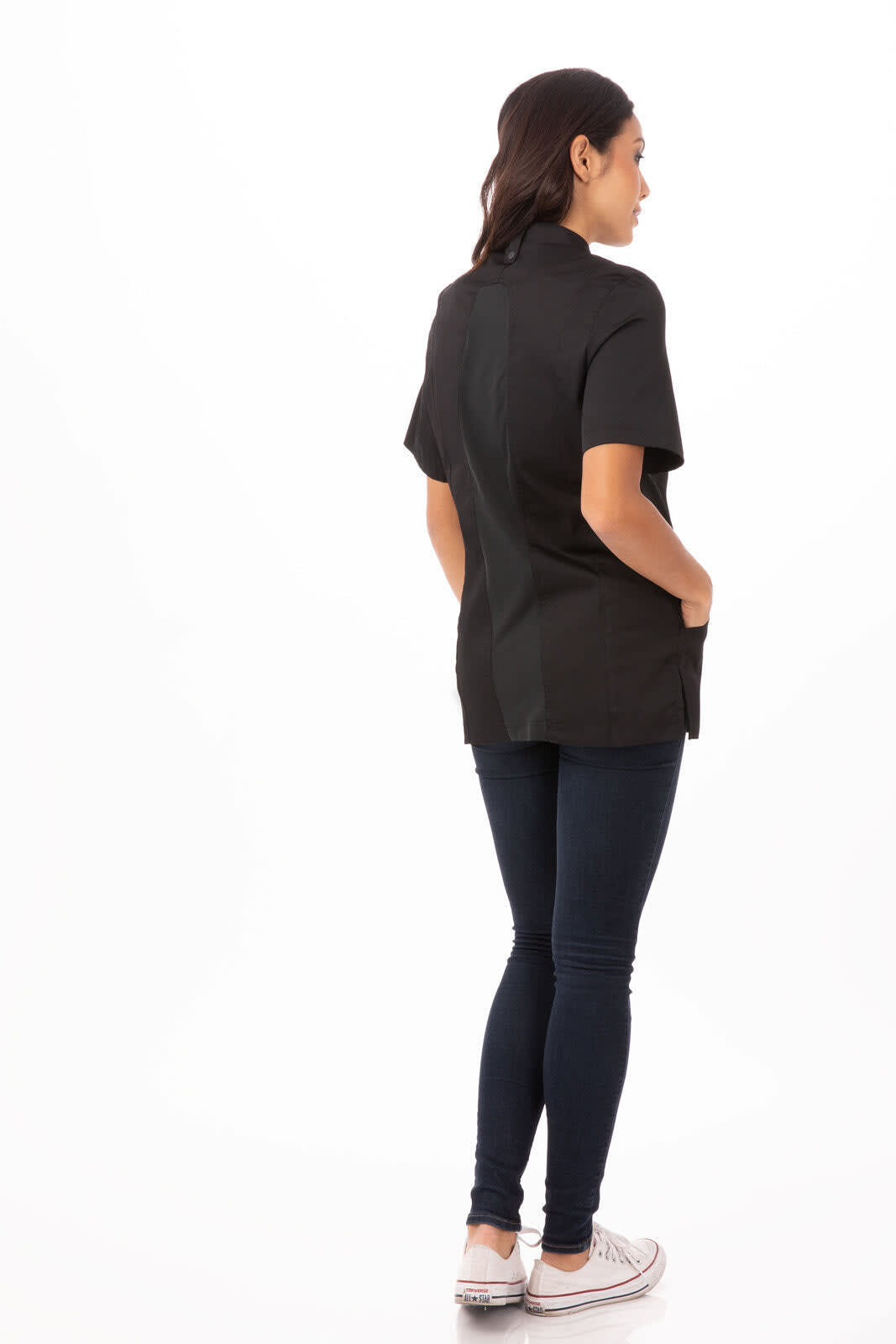 A black women's chef jacket displayed on a model, featuring short sleeves and a minimal design.