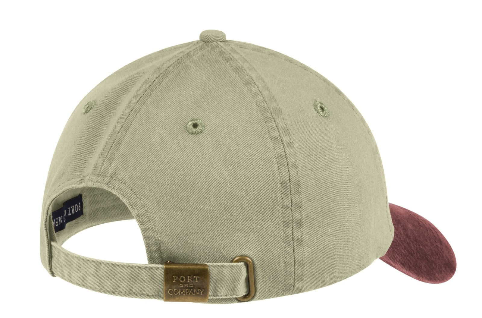 A two-tone pigment-dyed cap featuring a khaki body and a burgundy brim, with an adjustable strap and a logo.