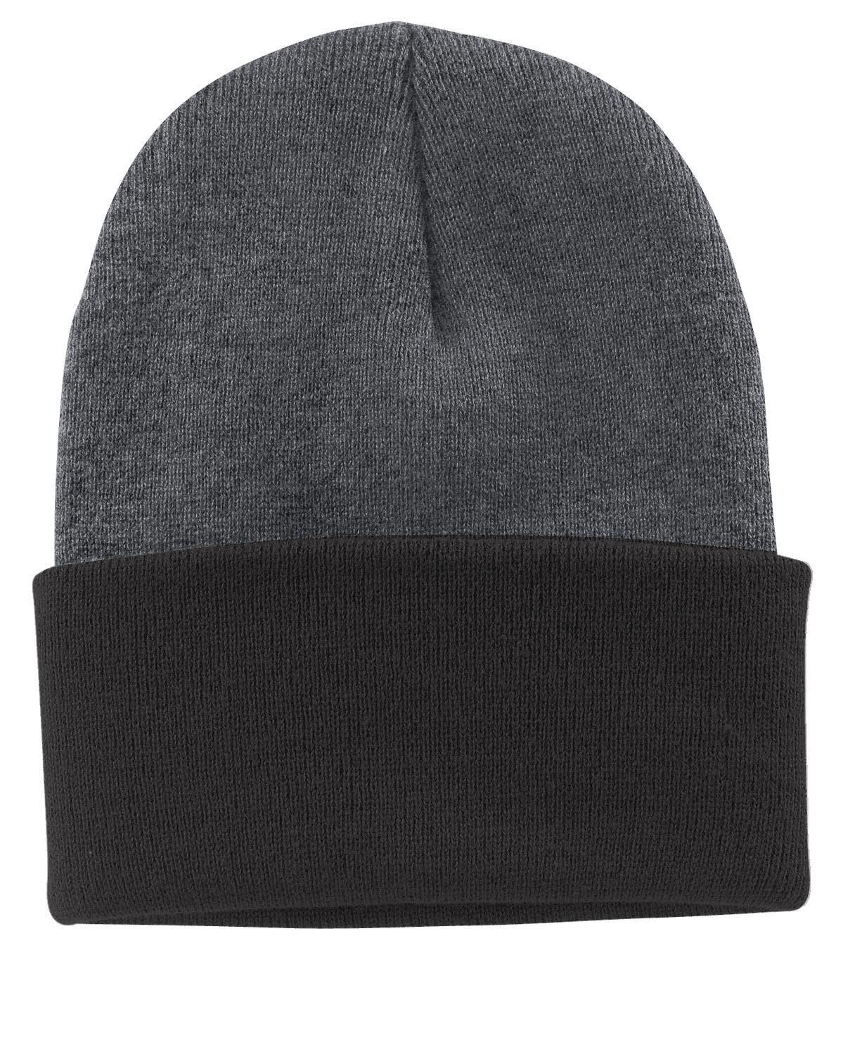 A beanie in dark grey and black, featuring a fold-over cuff and a tag on the inside.