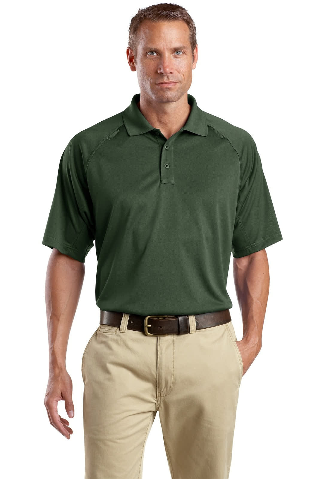 A man wearing a dark green, snag-proof tactical polo shirt, paired with beige trousers and a brown belt.