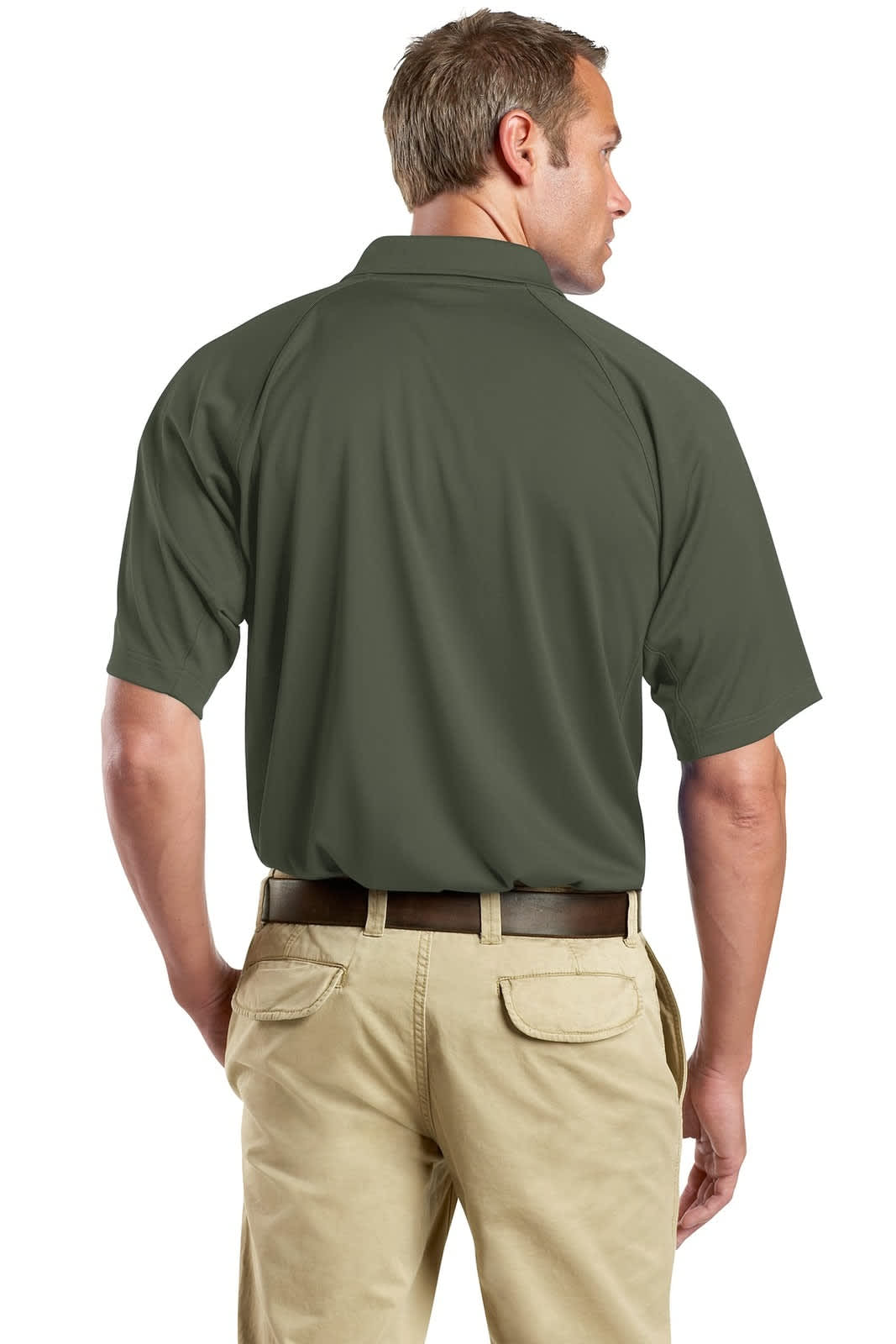 A man wearing a dark green snag-proof tactical polo shirt, viewed from the back, paired with khaki trousers.