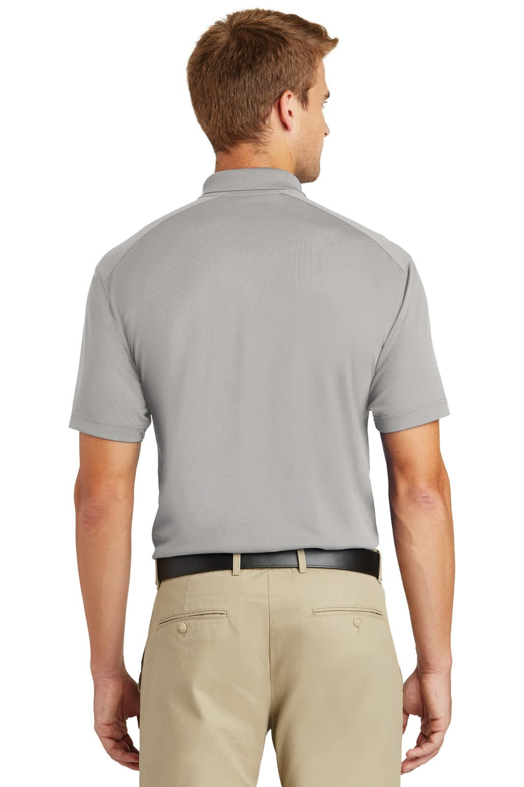 A grey polo shirt with a collar, shown from the back, featuring a logo and paired with beige trousers.