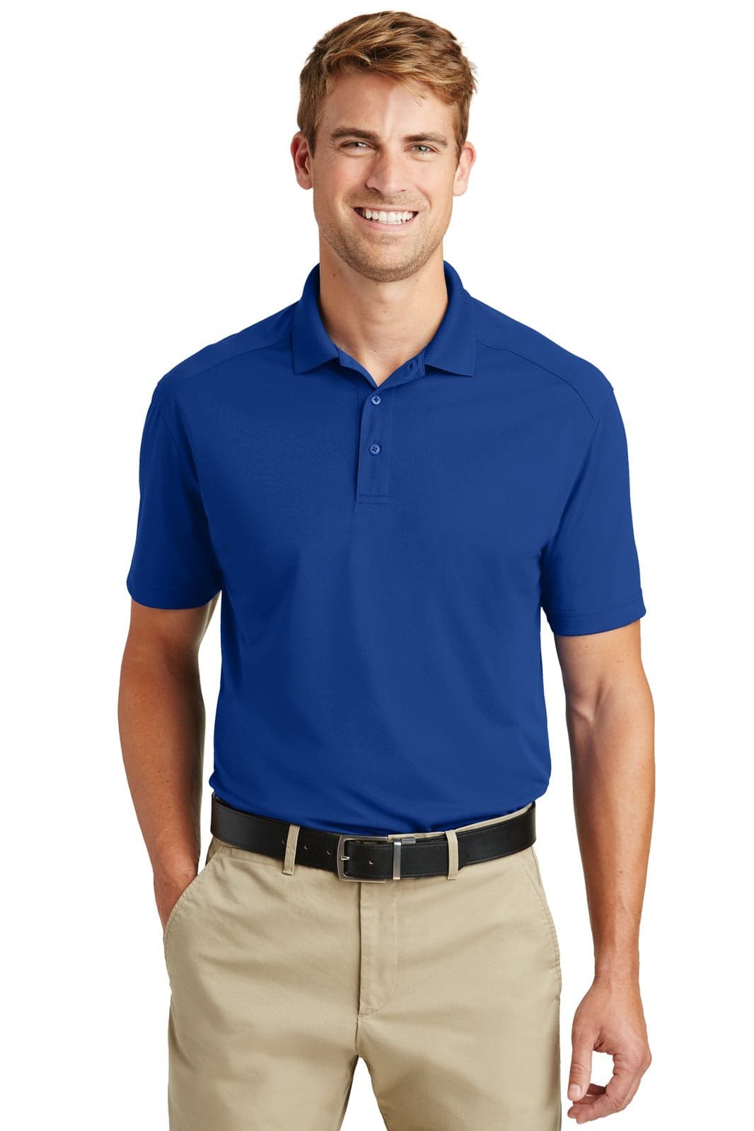 A man wearing a blue lightweight polo shirt with a collar, paired with light-coloured trousers. The shirt has a small logo.