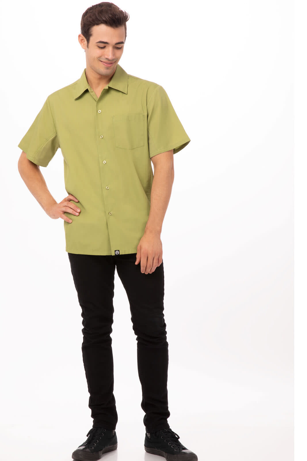 A men's short-sleeve shirt in a light green colour, paired with black trousers and standing on a white background.