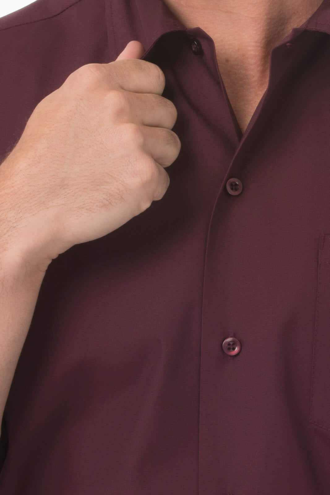A men's shirt in a deep burgundy colour with a button-up design and a front pocket. It features a branding logo.
