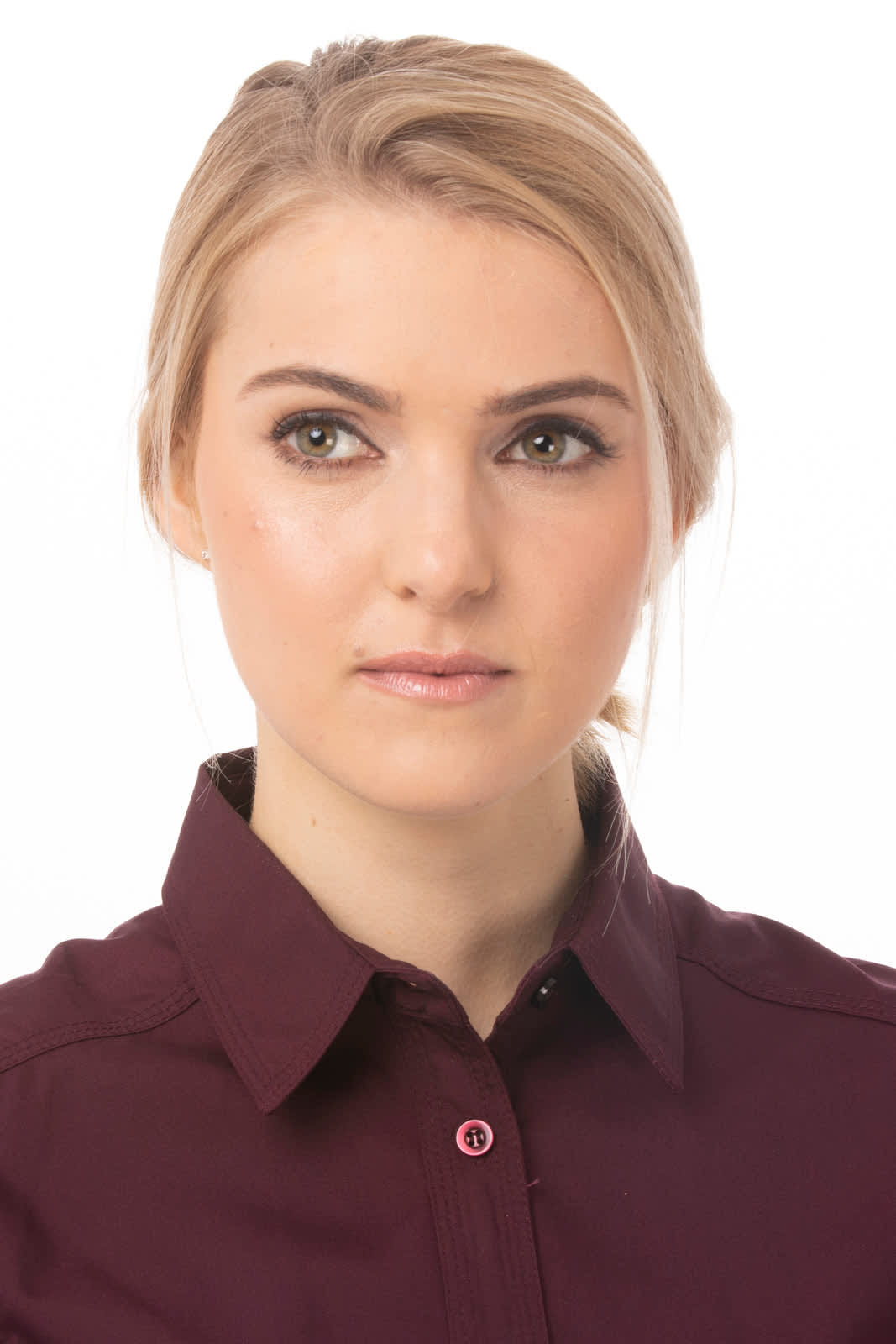 A maroon shirt with a button-up collar, displayed on a model with light blonde hair and natural makeup.