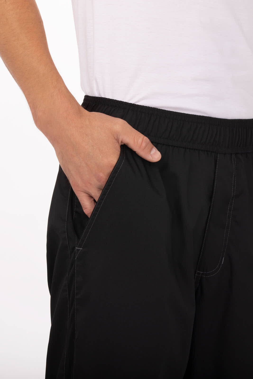Black men's chef pants featuring an elastic waistband and pockets. The fabric appears lightweight and breathable.