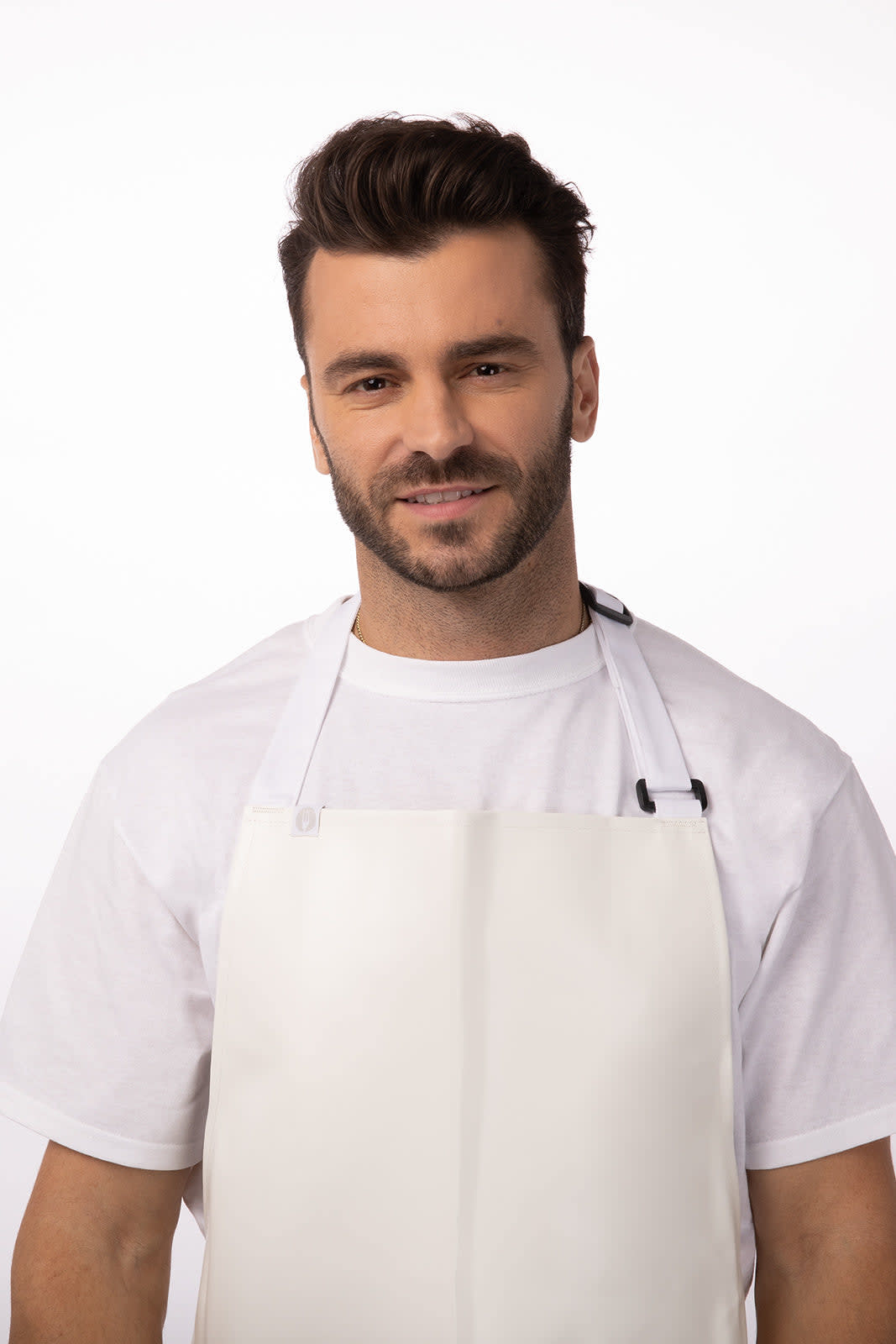 A white PVC bib apron worn by a model, featuring a simple design and adjustable neck straps.
