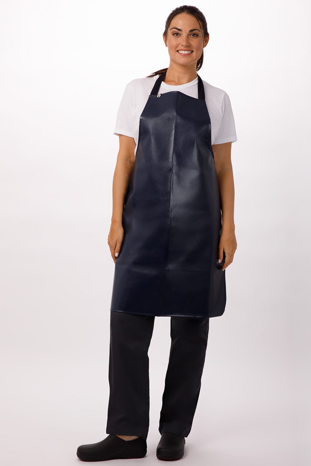 A navy PVC bib apron is worn by a model, showcasing its durable design and adjustable neck strap.