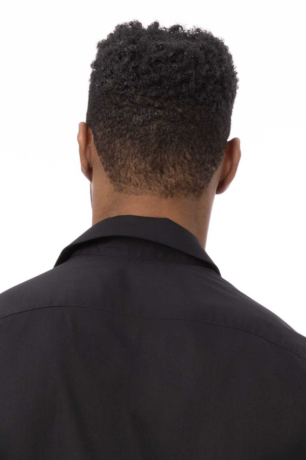 A black button-up men's dress shirt viewed from the back, featuring a collar and smooth fabric.