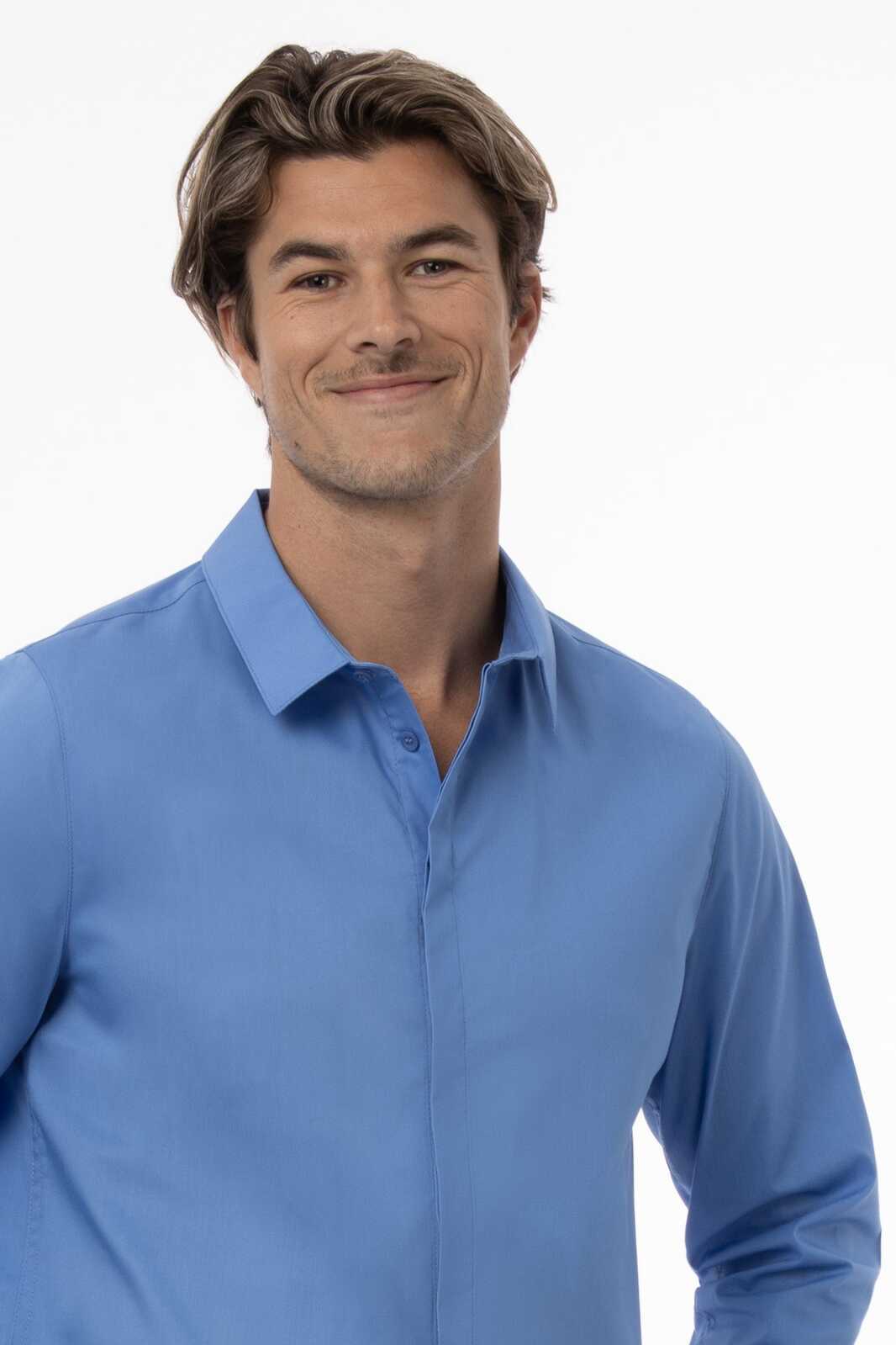 A blue premium formal men's dress shirt with a button-up design, modelled by a smiling man. The shirt features a logo.