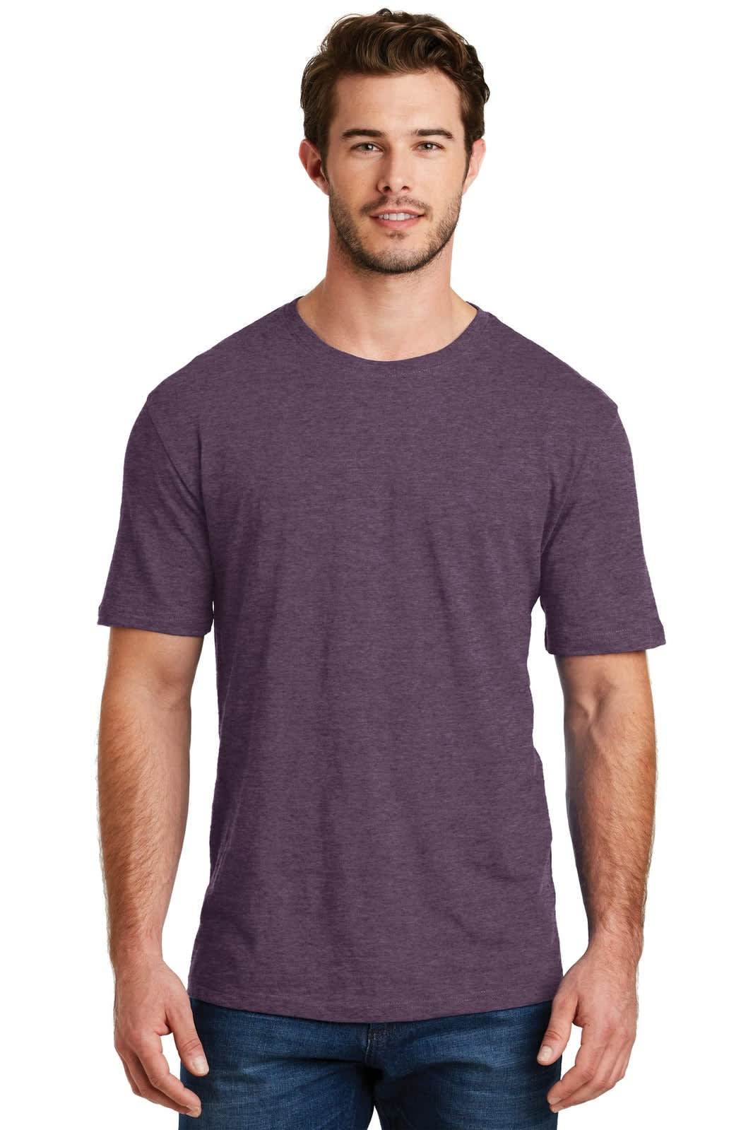 A man wearing a purple crew tee shirt, standing upright and looking towards the camera. The shirt features a logo.