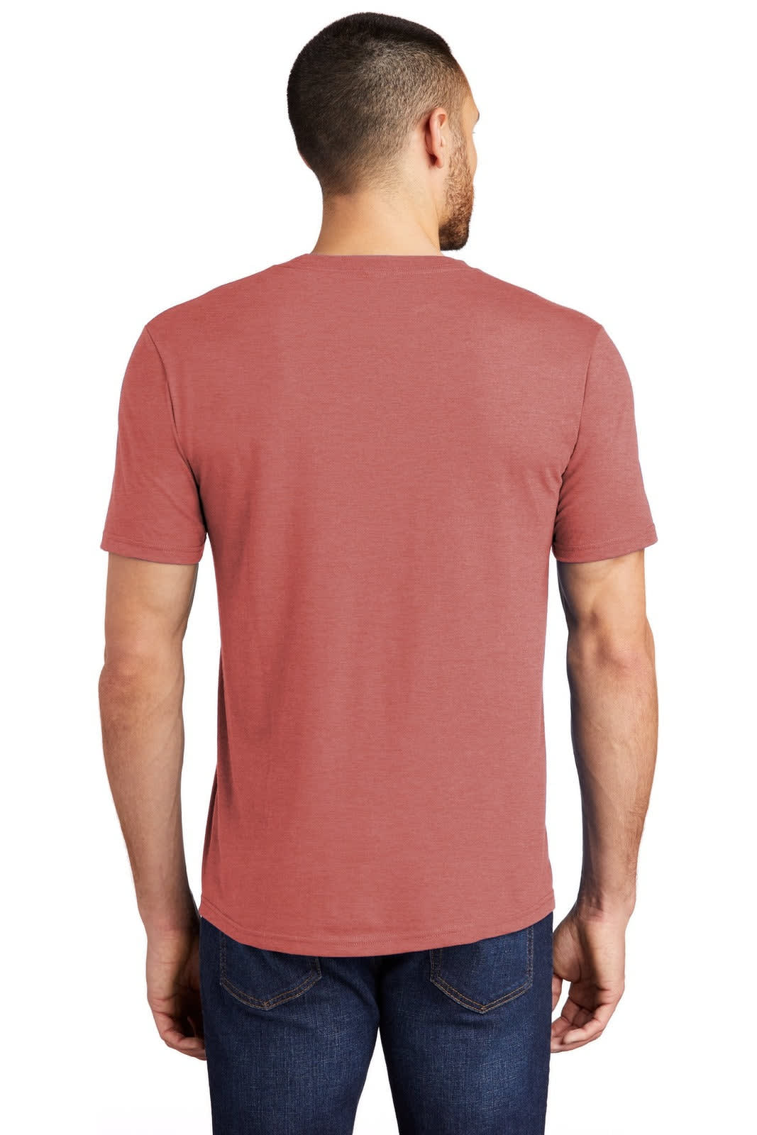 A man wearing a red t-shirt, viewed from the back, paired with dark jeans. The shirt features a logo.