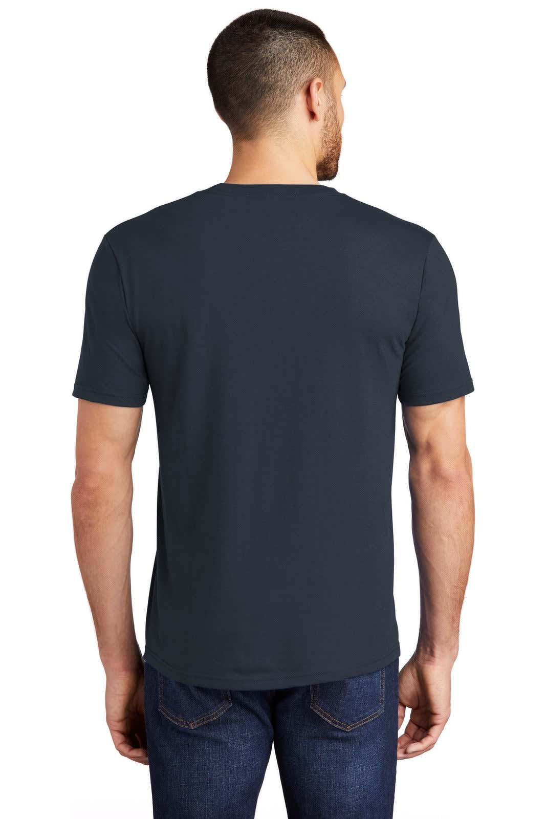 A man wearing a navy blue crew t-shirt, viewed from the back, with short sleeves and a casual fit.