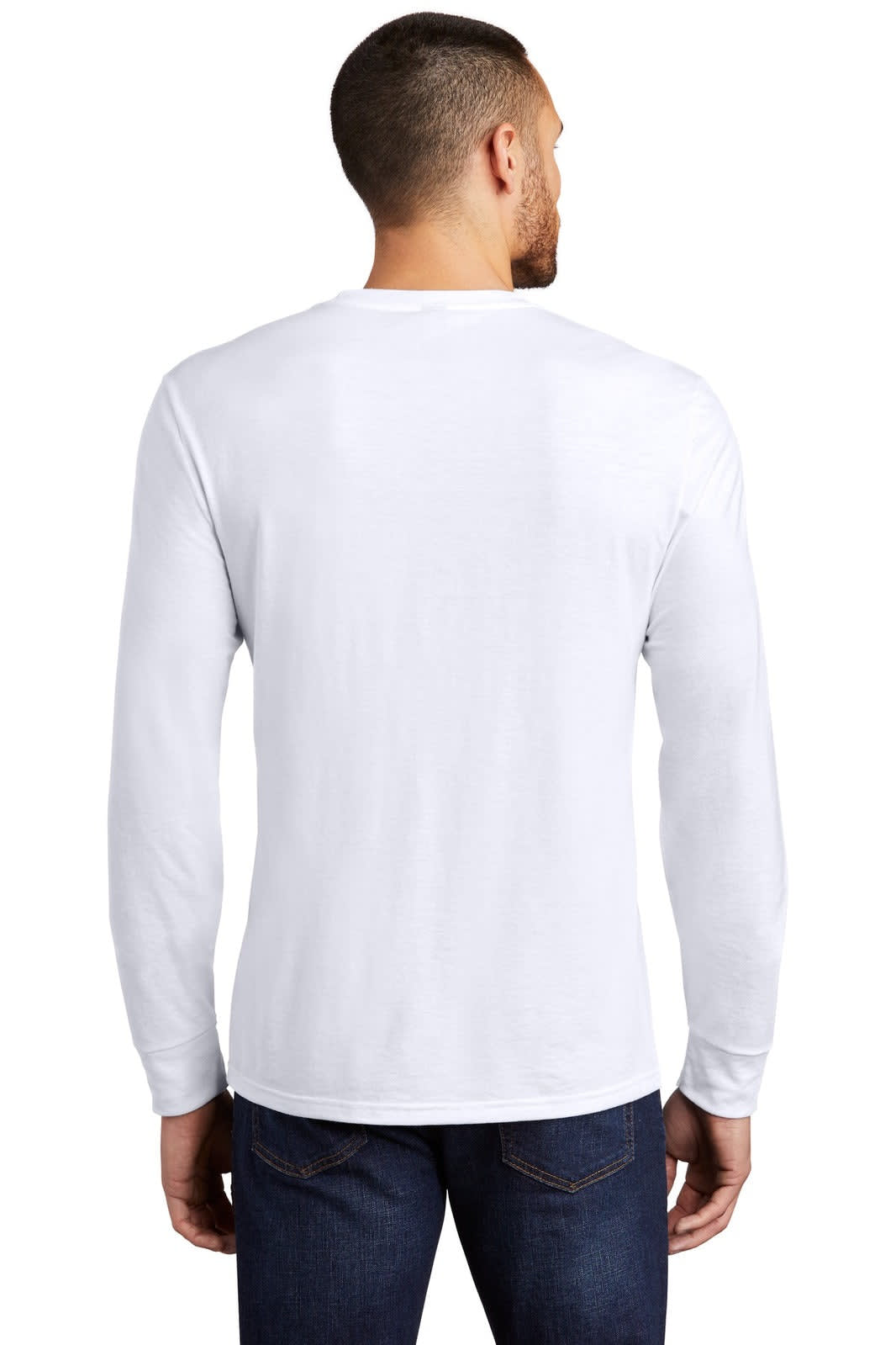 A man wearing a white long sleeve crew tee from the back, paired with dark jeans. The shirt has a logo.