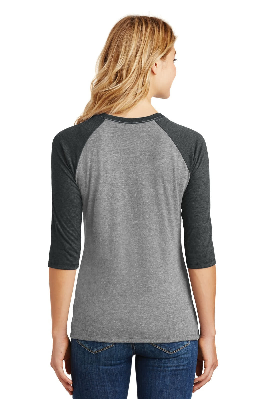 A grey and dark grey 3/4-sleeve raglan shirt, viewed from the back, worn by a woman. The shirt has a logo.