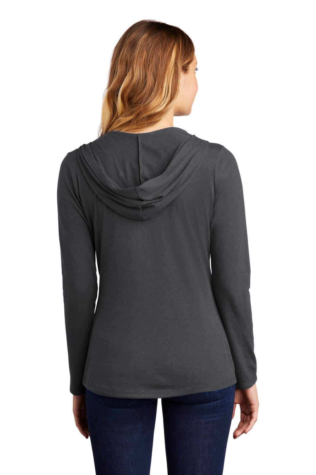 A woman wears a grey long sleeve hoodie with a hood, featuring a simple design and fitted style.