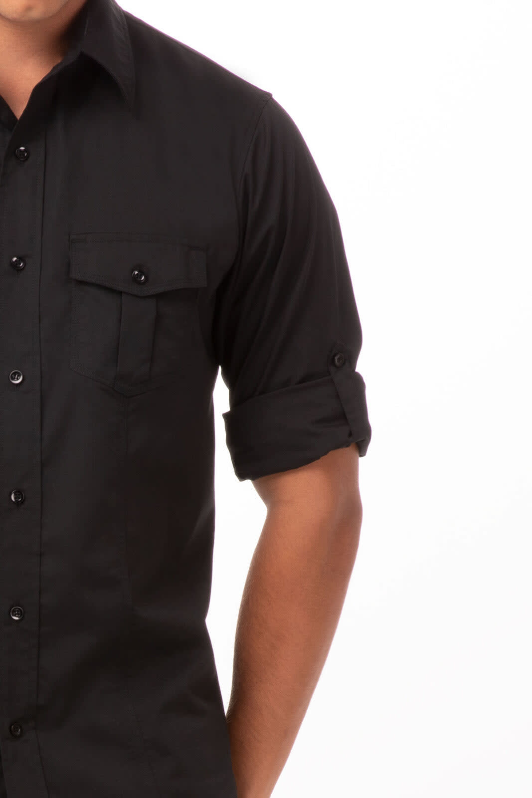 A black button-up men's shirt featuring rolled sleeves and two front pockets, with a logo present.