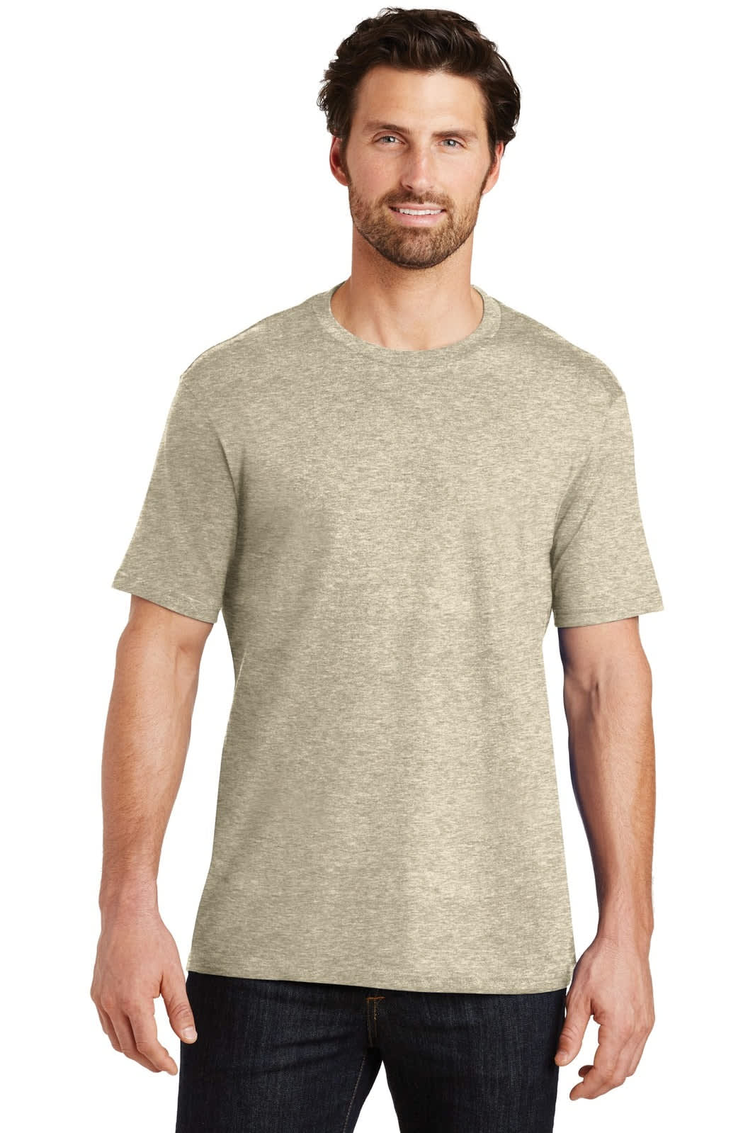 A man is wearing a light beige crew neck t-shirt. The shirt features short sleeves and has a logo.