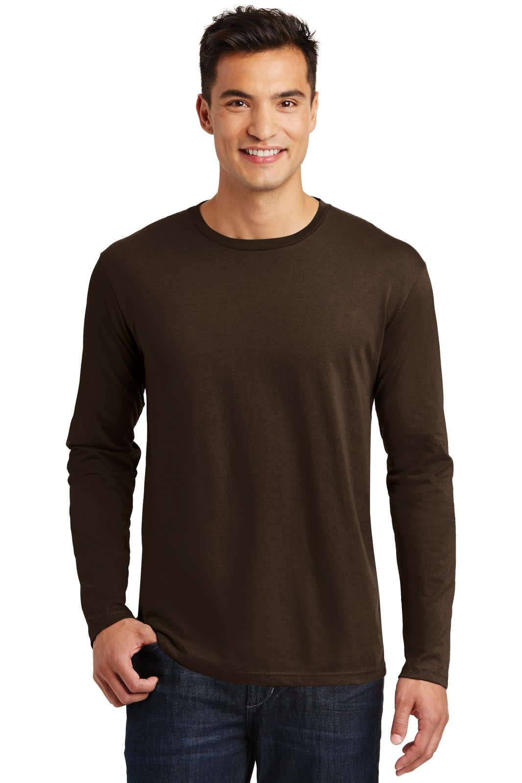 A man wears a long sleeve t-shirt in dark brown, featuring a logo. The shirt has a classic fit and crew neck.