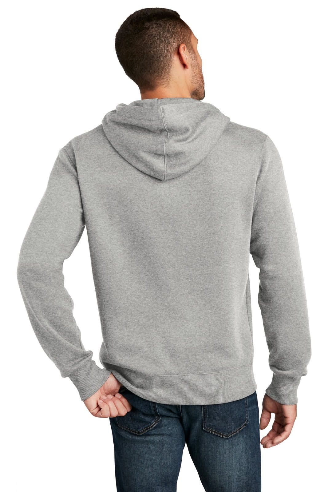 A grey fleece hoodie with a hood and long sleeves, worn by a person facing away, featuring a logo.