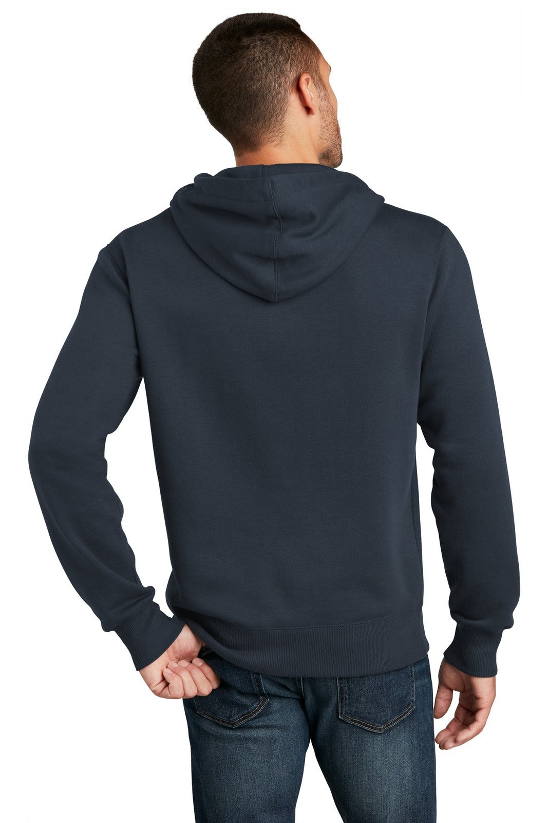 A man is wearing a navy blue District Perfect Weight Fleece Hoodie, viewed from the back. The hoodie has a logo.