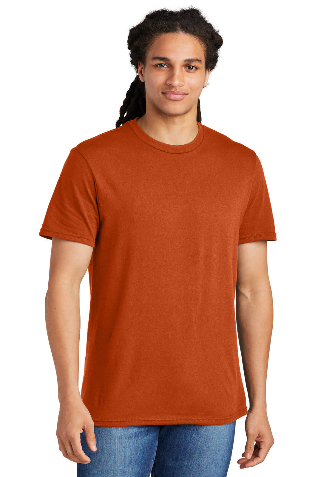 A young man wearing an orange t-shirt with a standard crew neckline, featuring a brand logo.