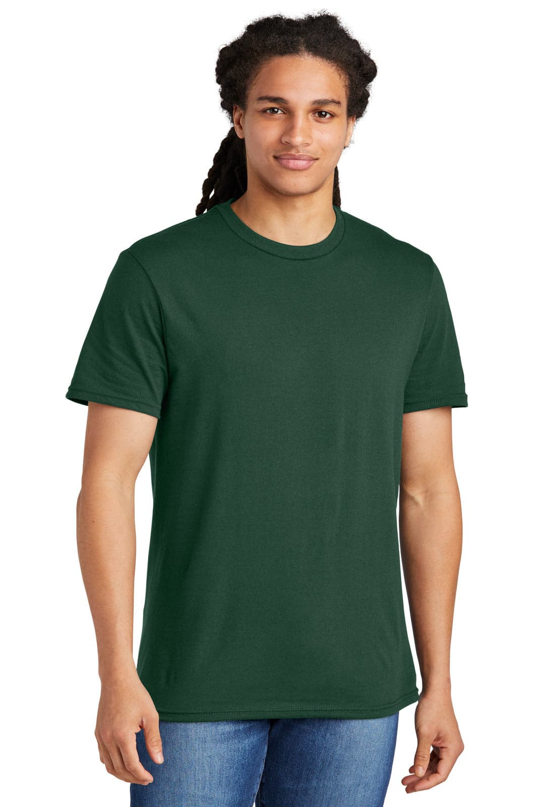 A young man in a green T-shirt stands against a plain background, showcasing a classic crew neckline and short sleeves.