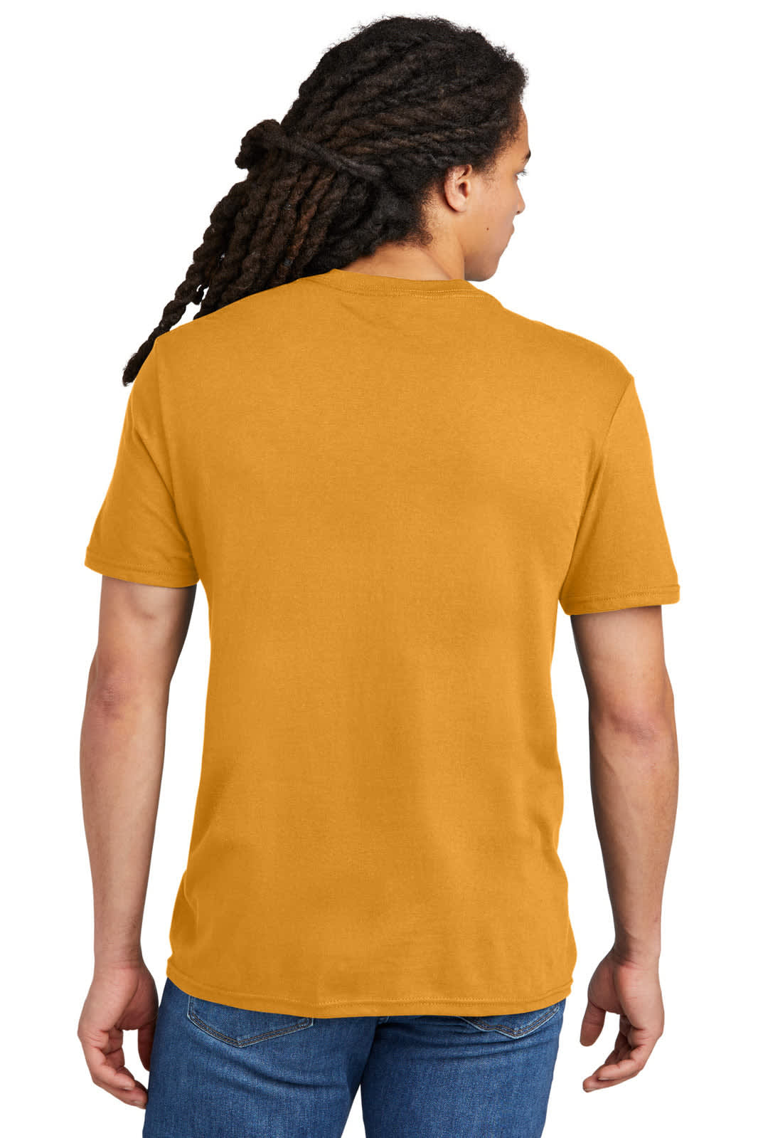 A back view of a mustard yellow t-shirt on a model with long, curly hair, featuring a logo.