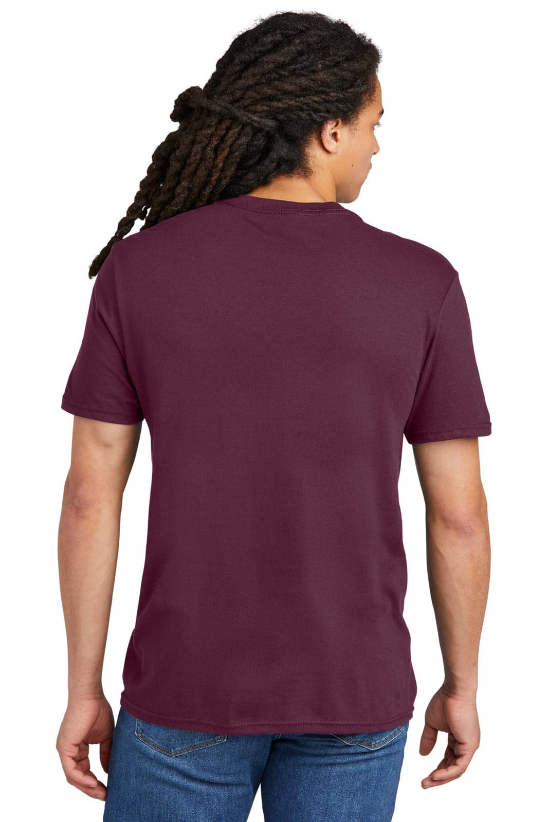 A young man with dreadlocks wears a maroon T-shirt, showcasing the back view of the garment.
