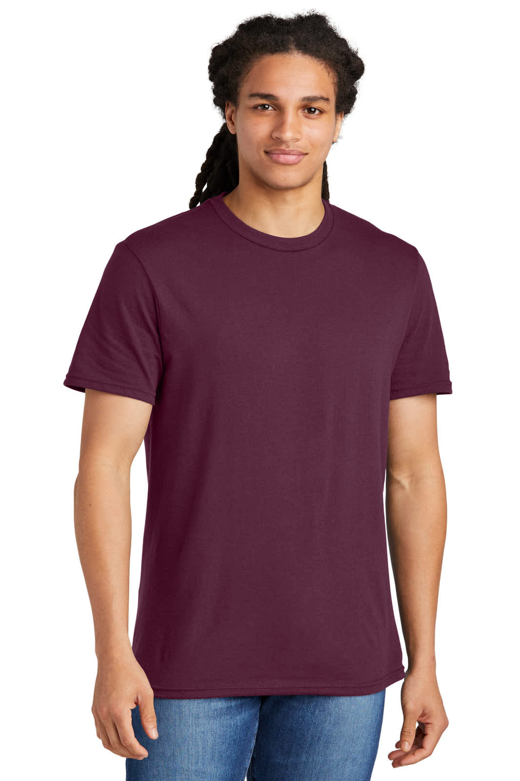 A young man wearing a maroon short-sleeve T-shirt. The shirt features a logo on the front.