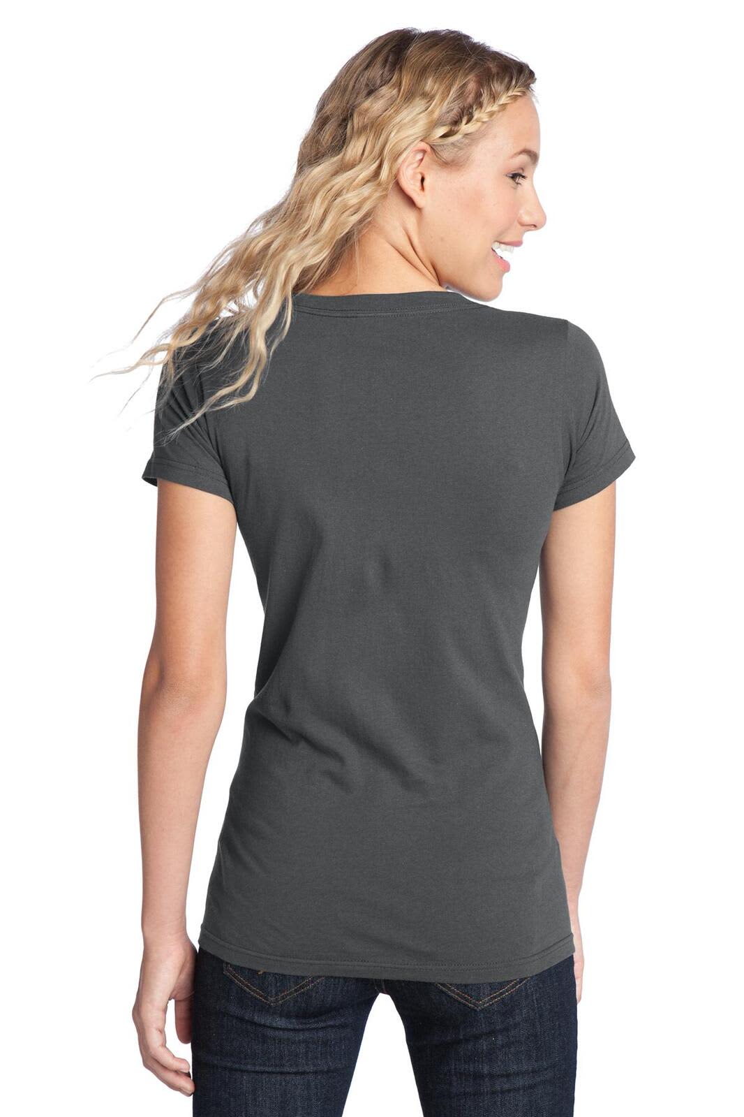 A grey juniors' t-shirt with a fitted design, shown from the back on a model with wavy blonde hair.