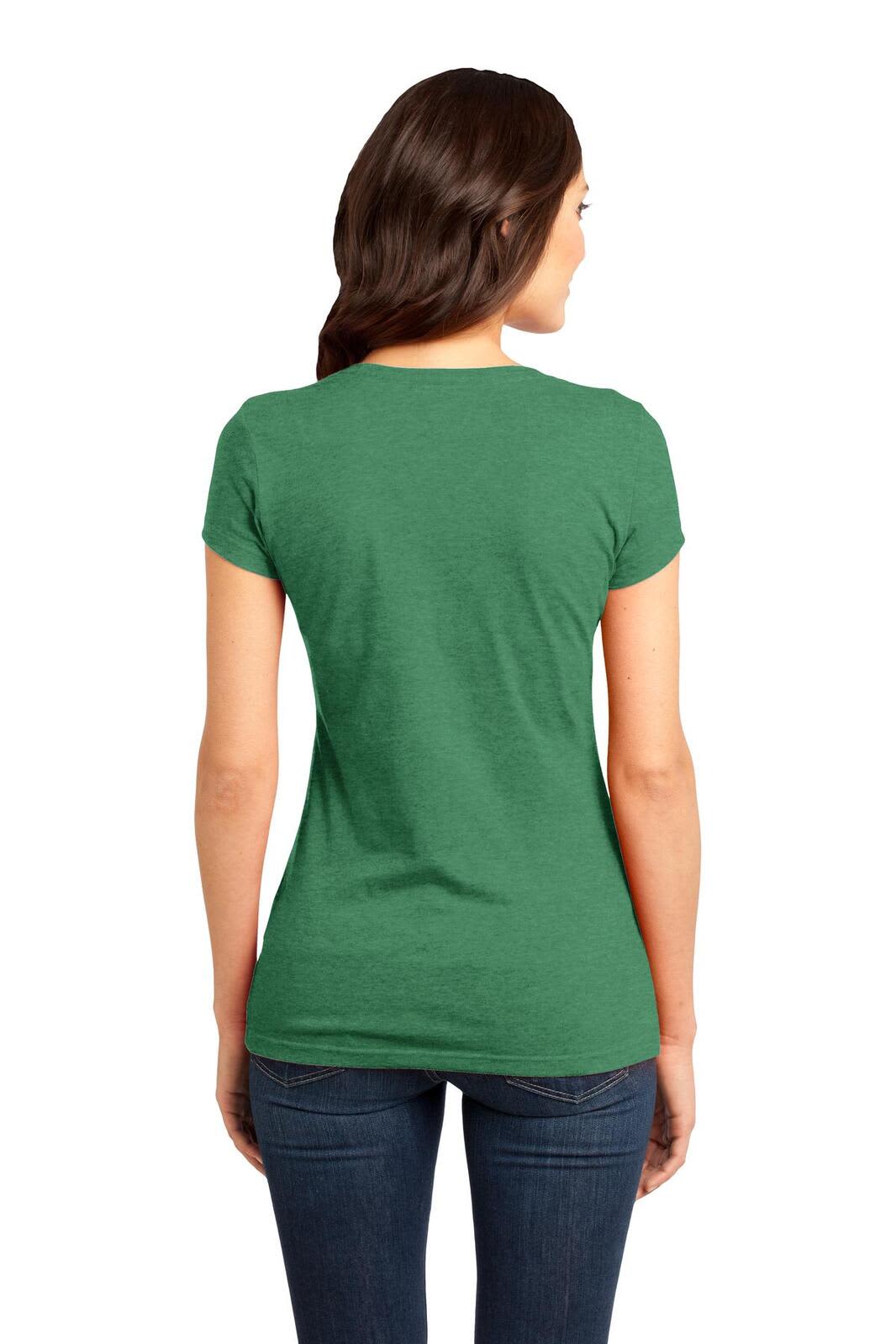A green juniors t-shirt displayed on a model, featuring a fitted style and short sleeves.