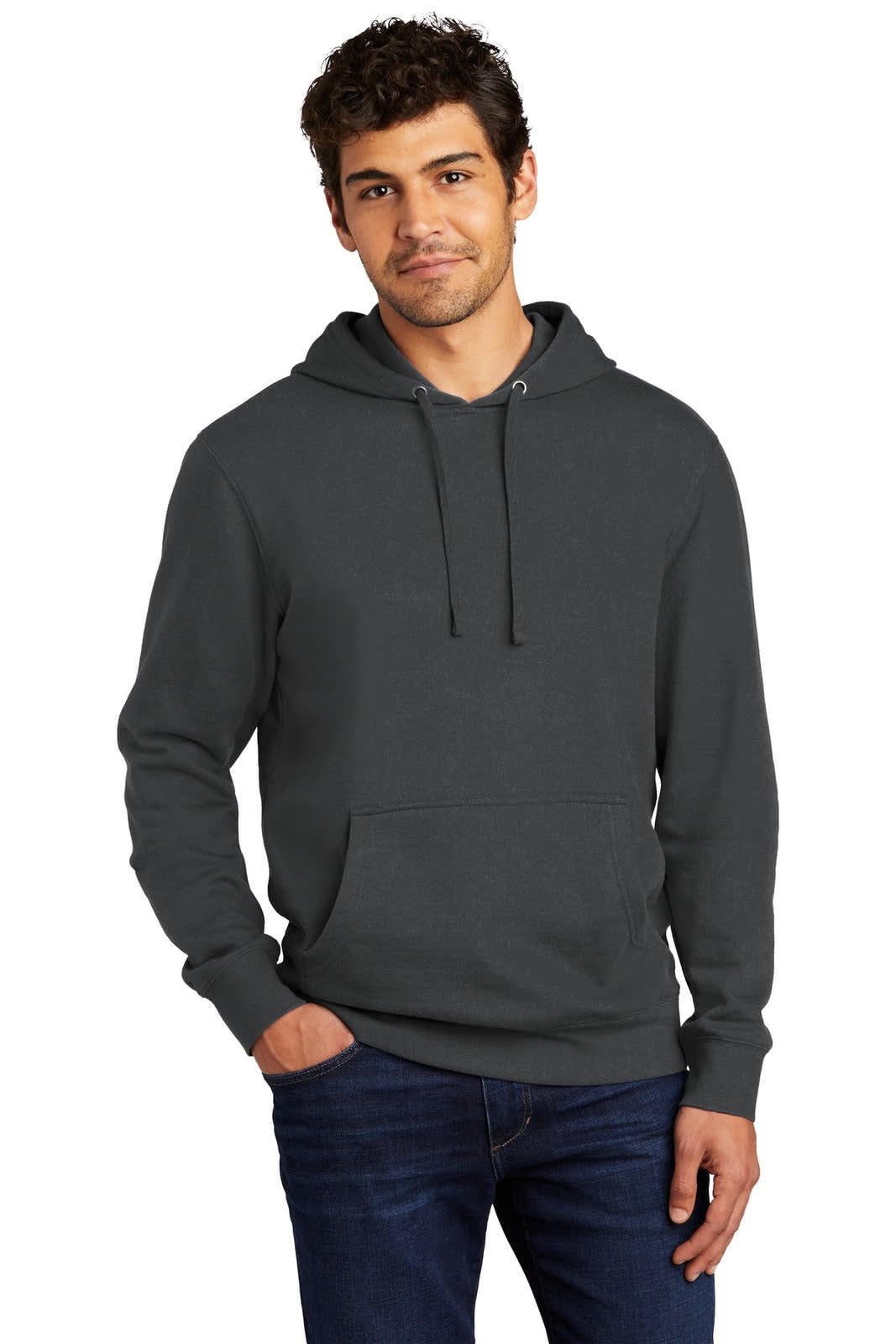 A man wearing a dark grey fleece hoodie with a front pocket and a logo. The hoodie features a drawstring hood.