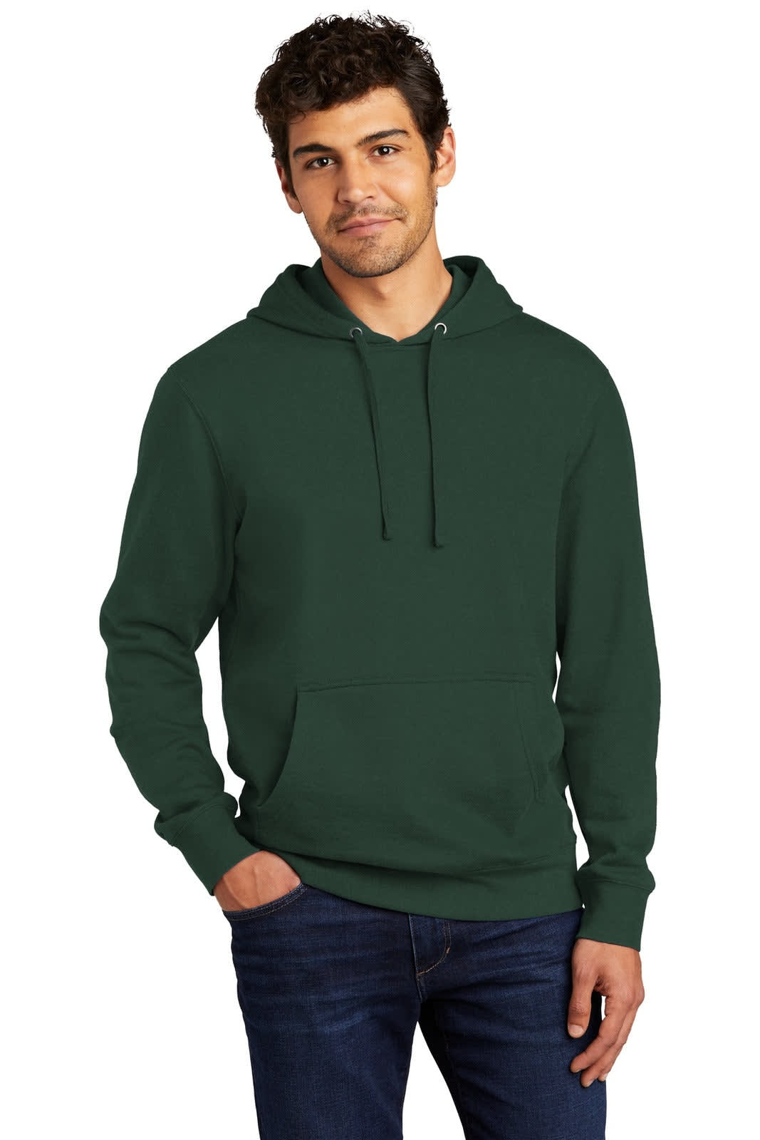 A man wearing a green fleece hoodie featuring a front pocket and a hood, with a logo visible.